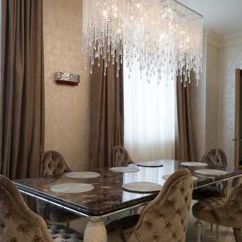Chandeliers by Cattelan Italia, wall lights by Masiero